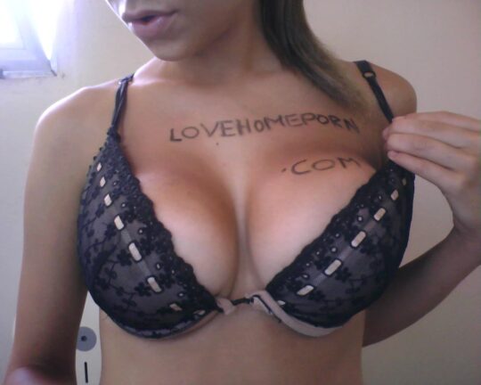 Model showcasing LoveHomePorn branding on Her Chest